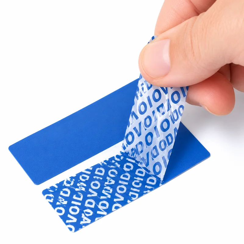 Tamper-evident security label revealing a VOID pattern